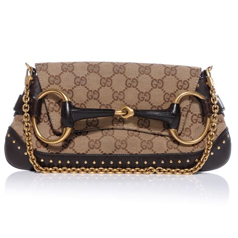 gucci monogram horsebit clutch.